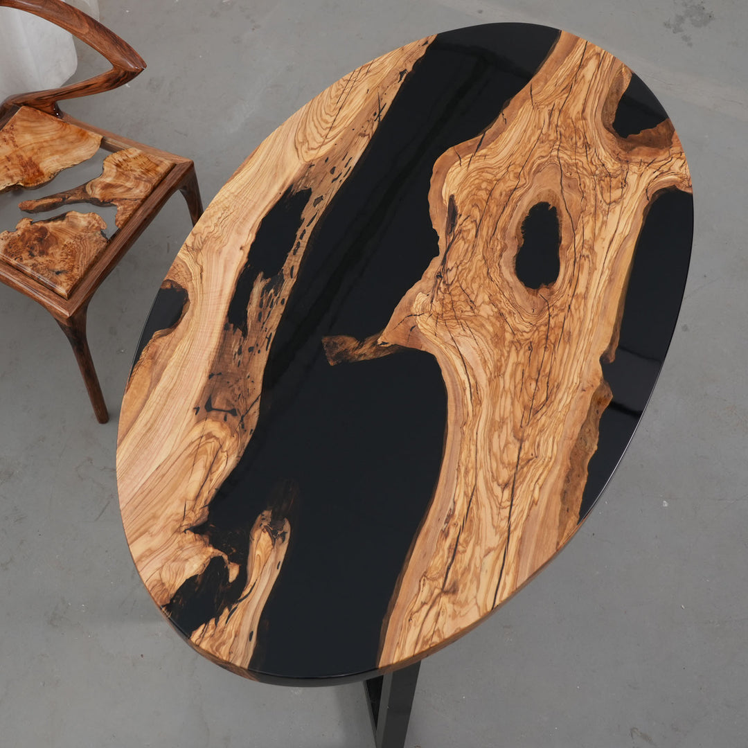 High-gloss olive wood tabletop with black epoxy details