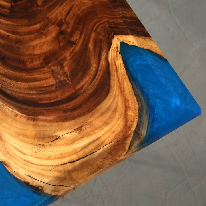 Close-up view of walnut dining table with detailed epoxy table inlay, natural wood texture, and refined tabletop craftsmanship - SeaWaveTable