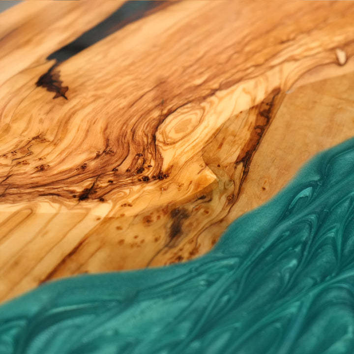 Olive wood resin river dining table for modern coastal interiors