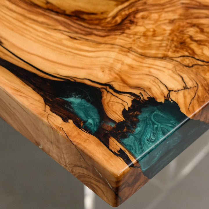 High-gloss olive wood epoxy dining table with coastal design