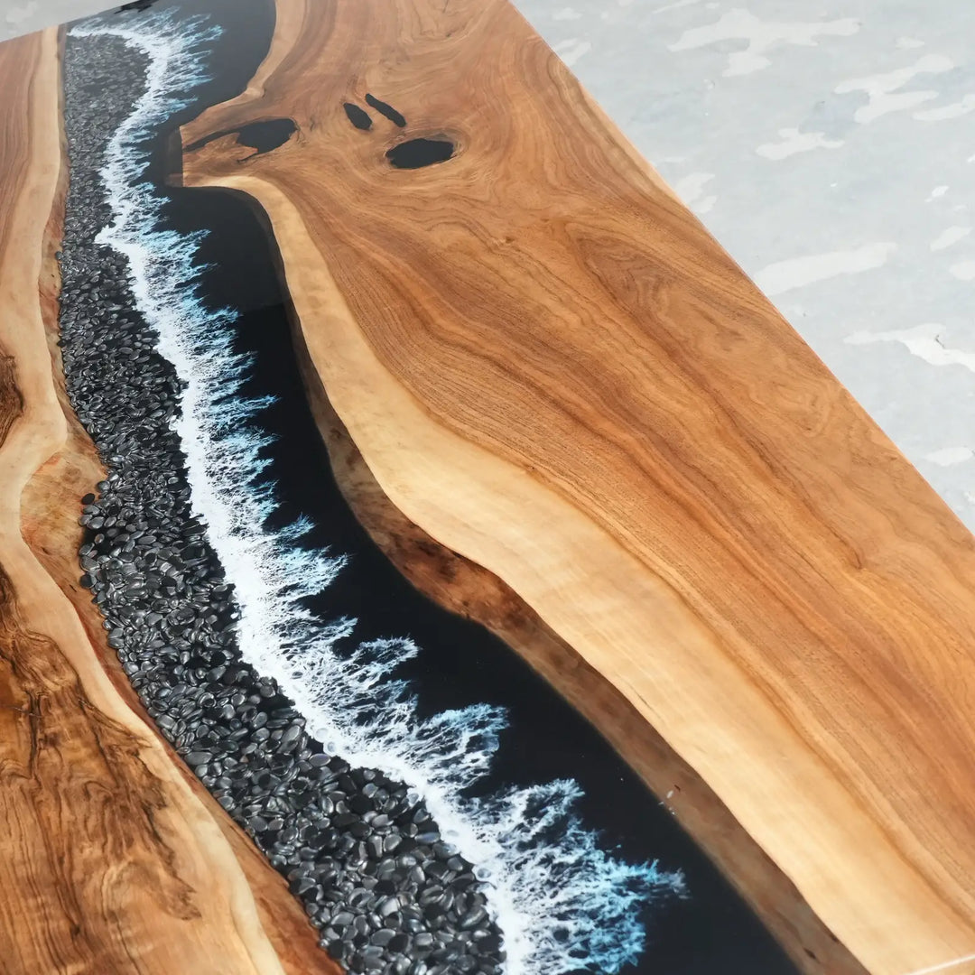 Coastal modern dining table with realistic white resin sea foam details