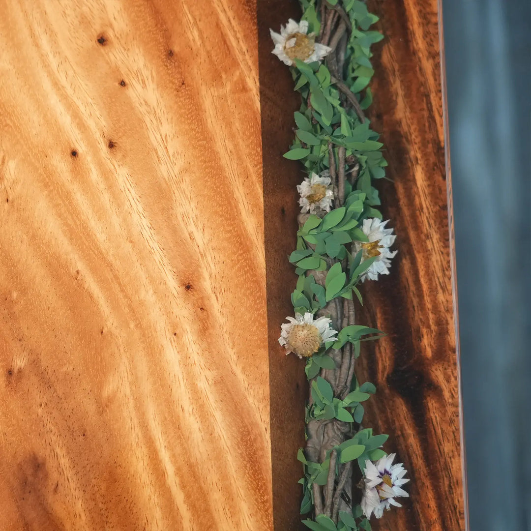 Santa Fe rustic dining table featuring a warm brown wood surface and detailed craftsmanship