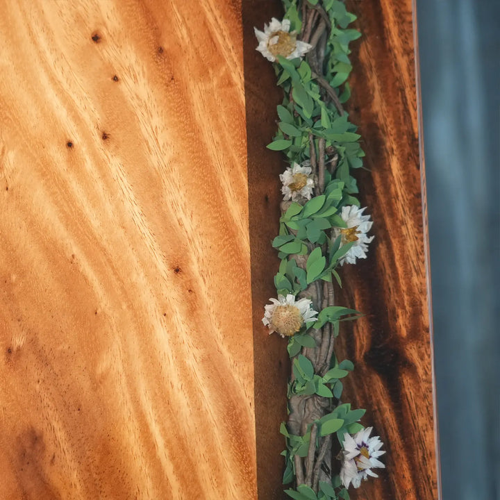 Santa Fe rustic dining table featuring a warm brown wood surface and detailed craftsmanship