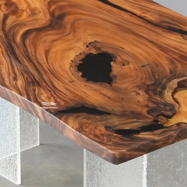 Statement live edge walnut table with artistic resin details for luxury dining room