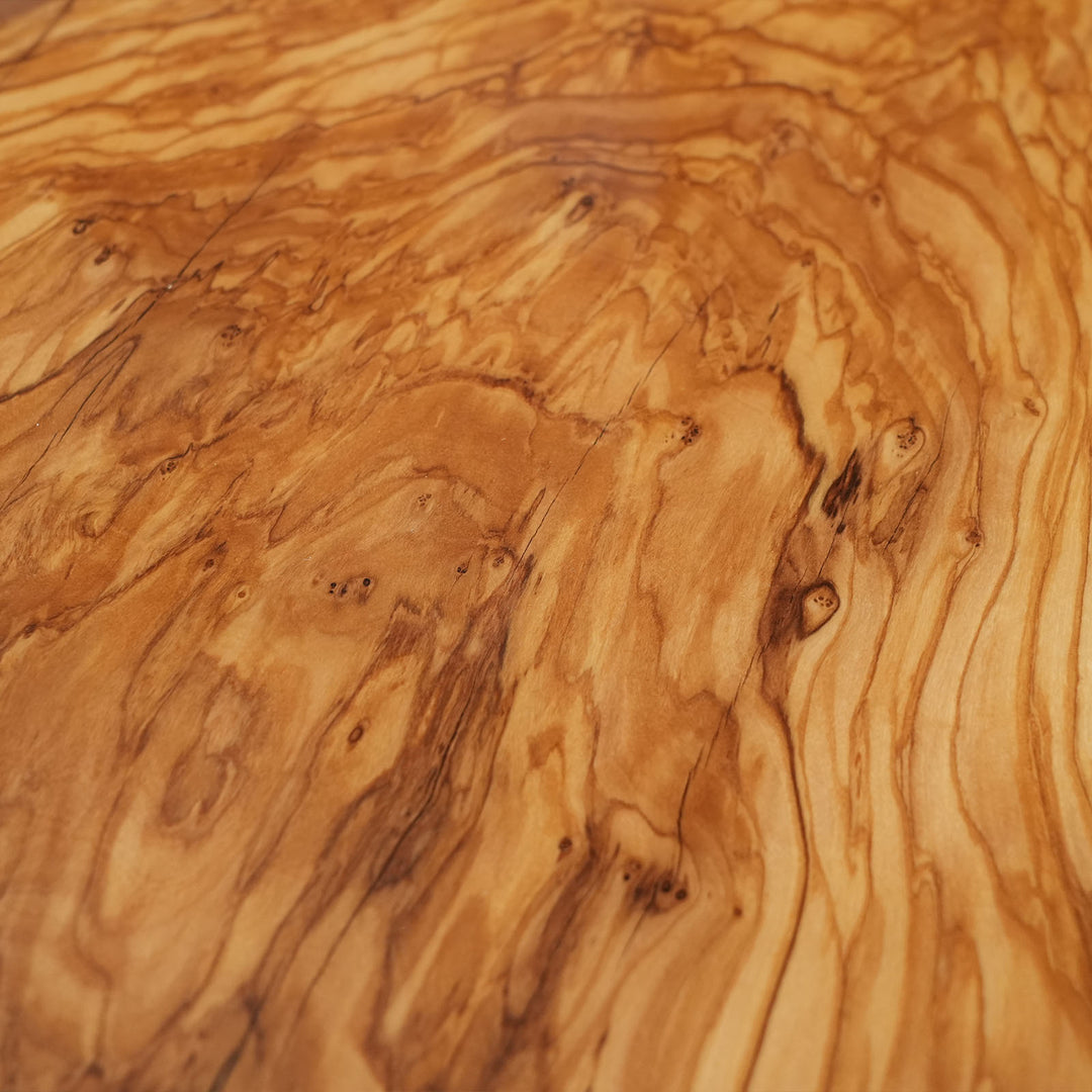 Minimalist black resin river dining table with live edge wood