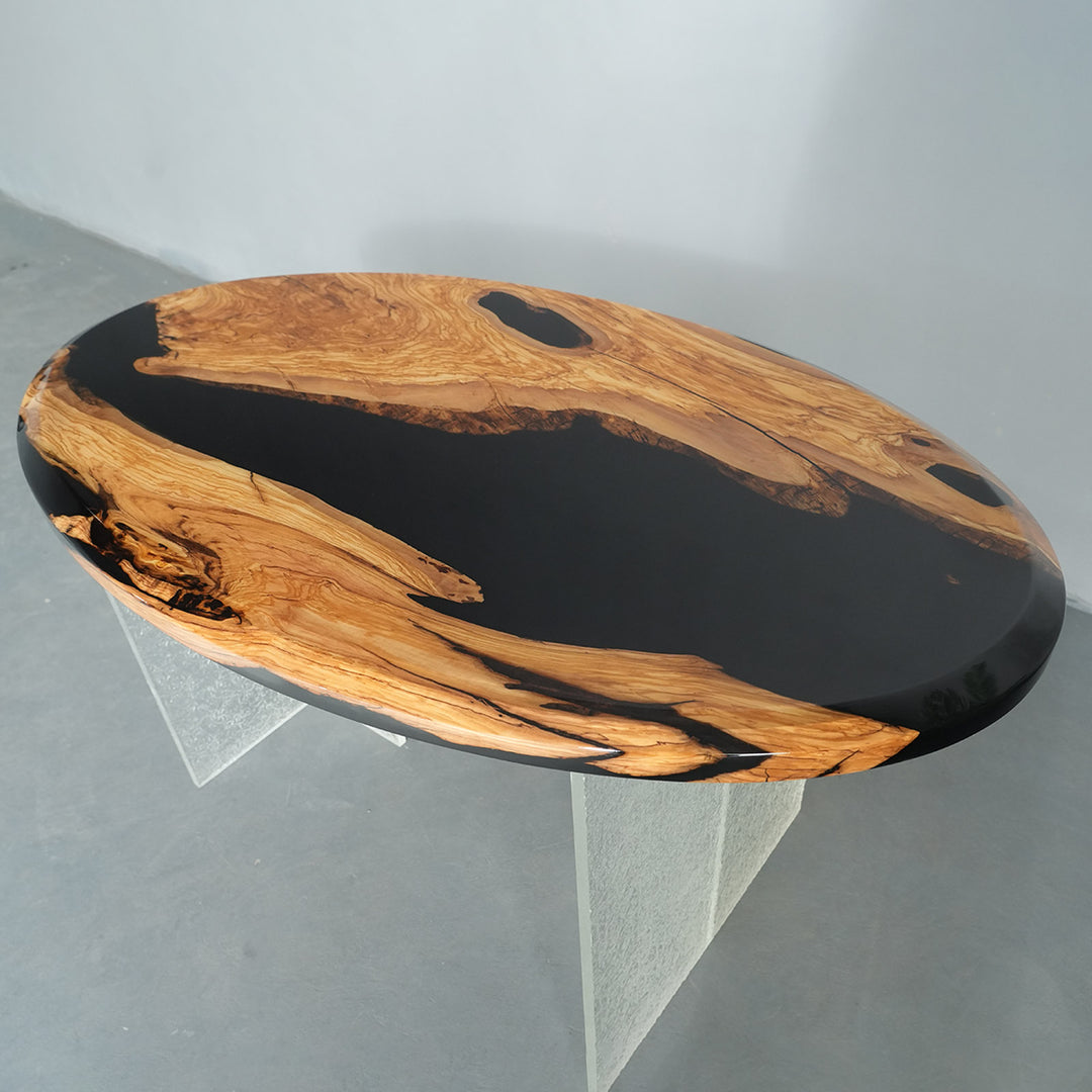 Organic modern black resin olive wood dining table