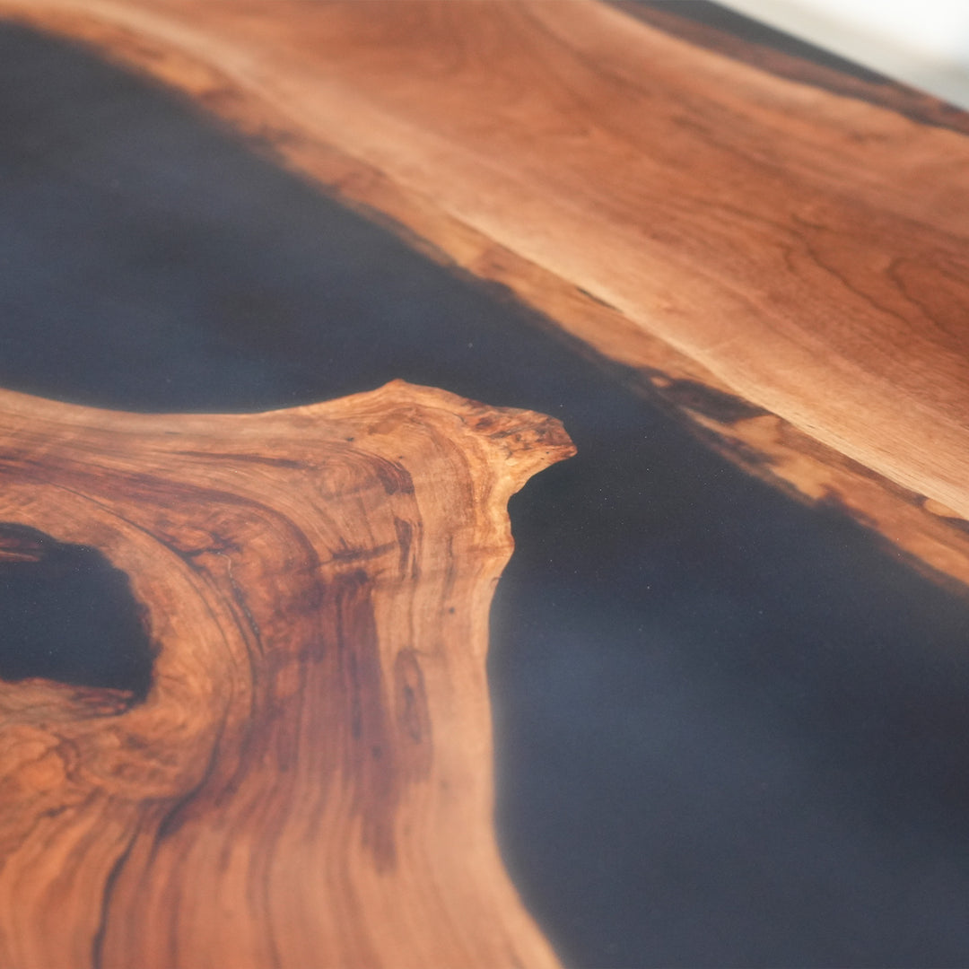Contemporary Seattle-style black walnut epoxy furniture table