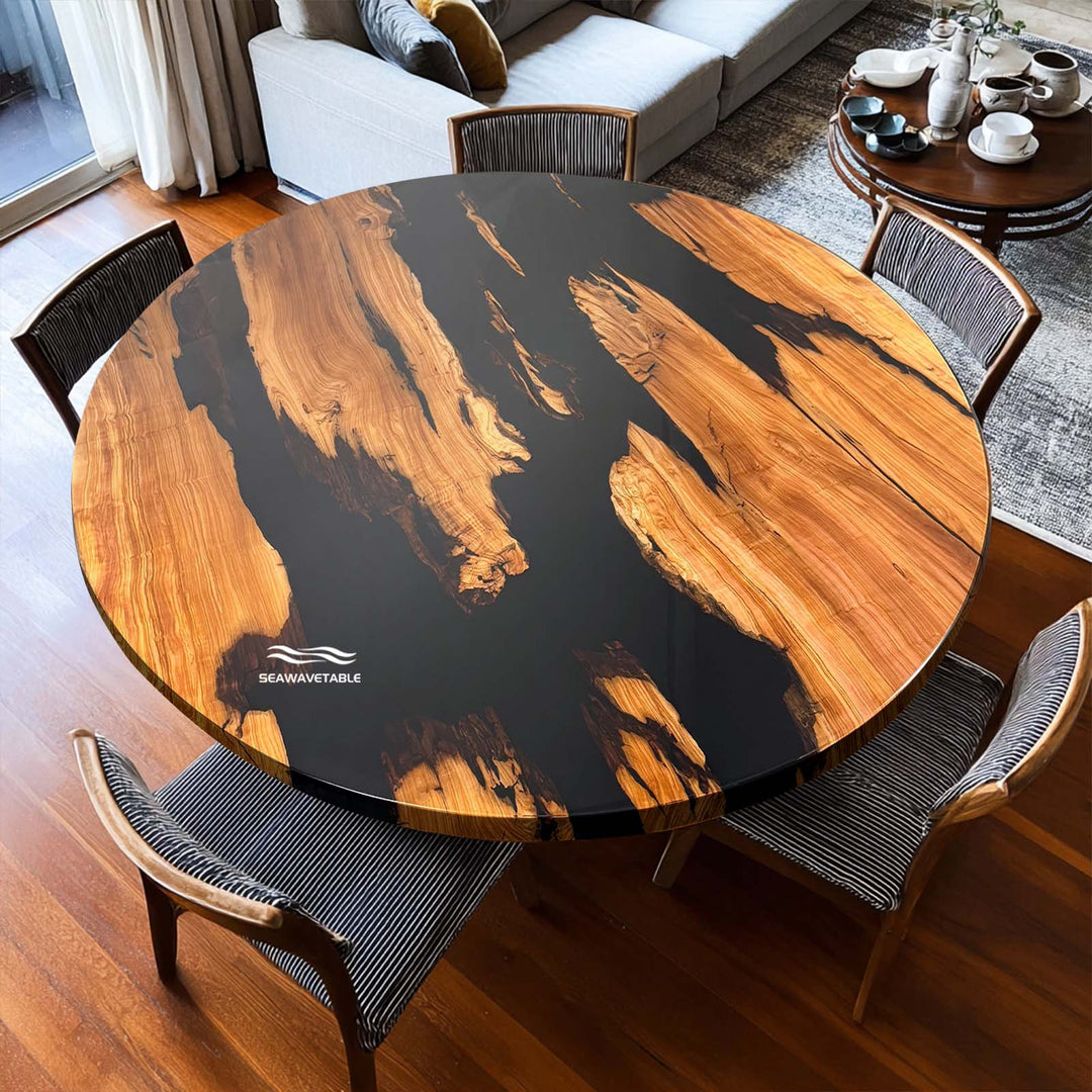 An inviting image of the round coffee table, ready for entertaining, highlighting the unique wood and resin pattern.