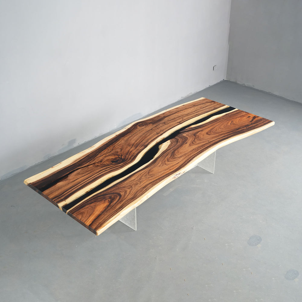 Handmade solid wood epoxy river table showcasing natural walnut grain