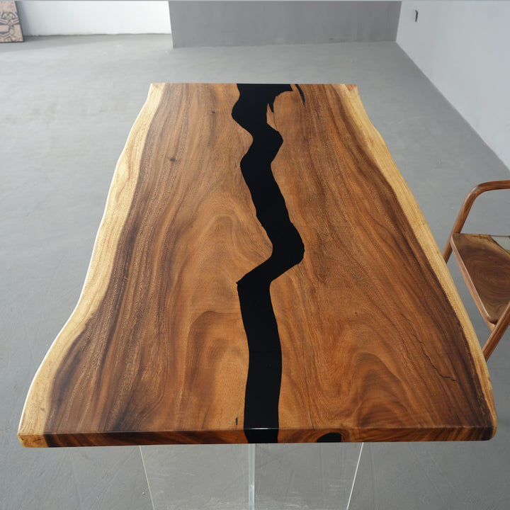 Black epoxy river table with premium walnut live-edge slab