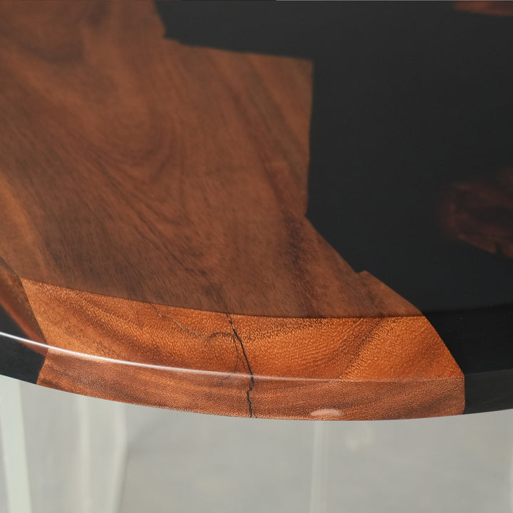 Contemporary black epoxy resin table with natural wood texture
