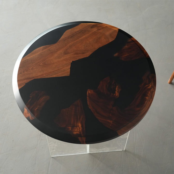 Handcrafted round river table made of black resin and walnut slab