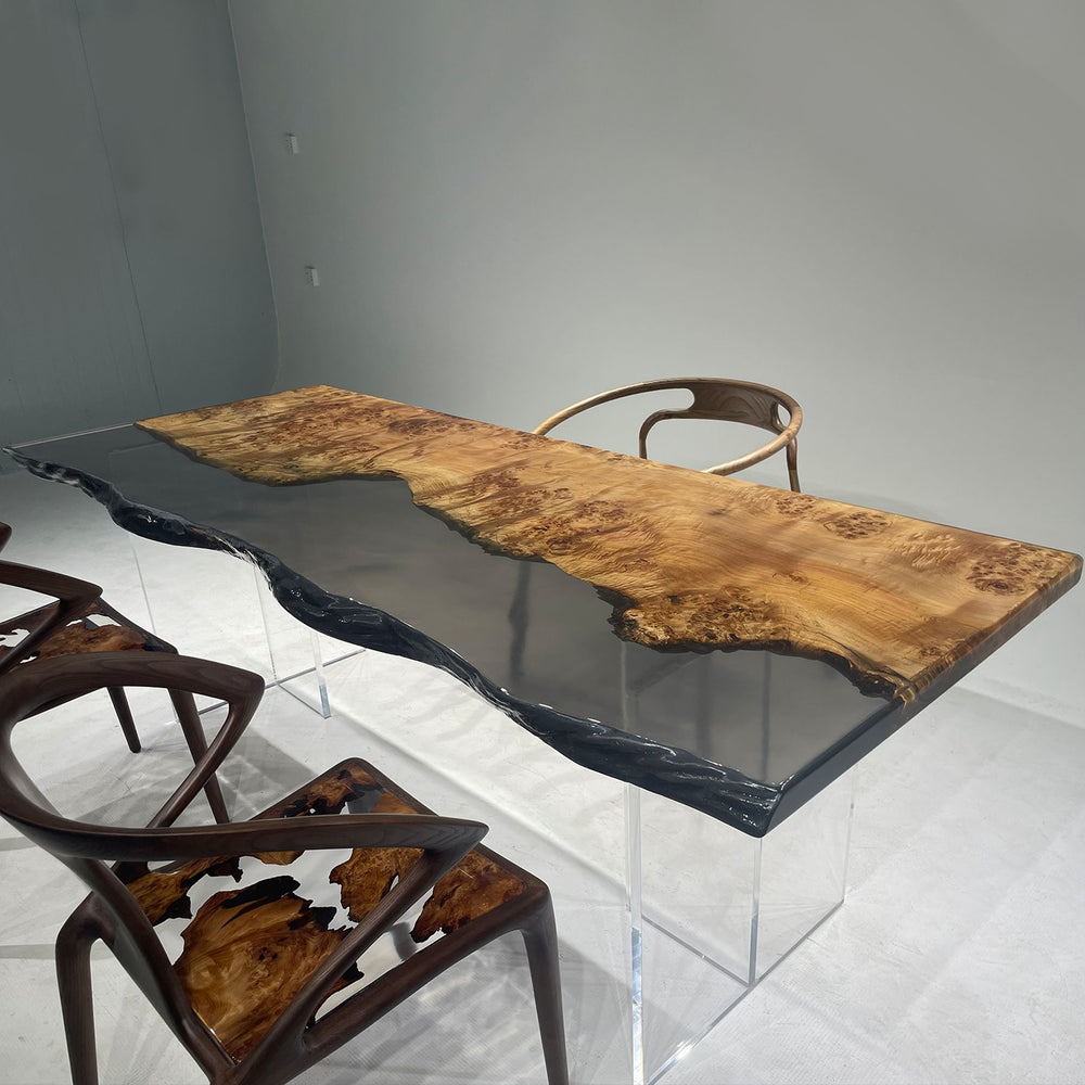 Elegant live - edge resin table with poplar wood, accompanied by stylish chairs