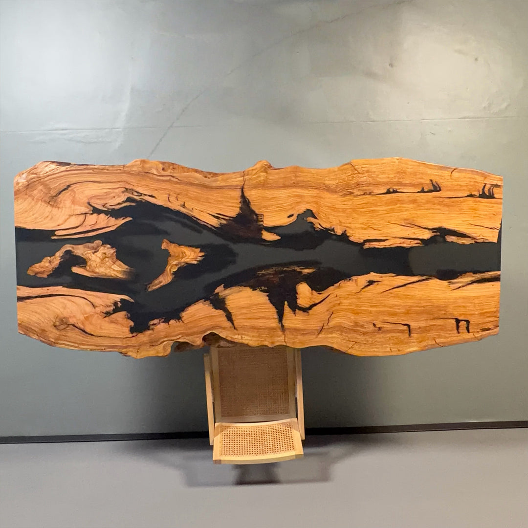 Natural hardwood table with epoxy river design and unique grain patterns