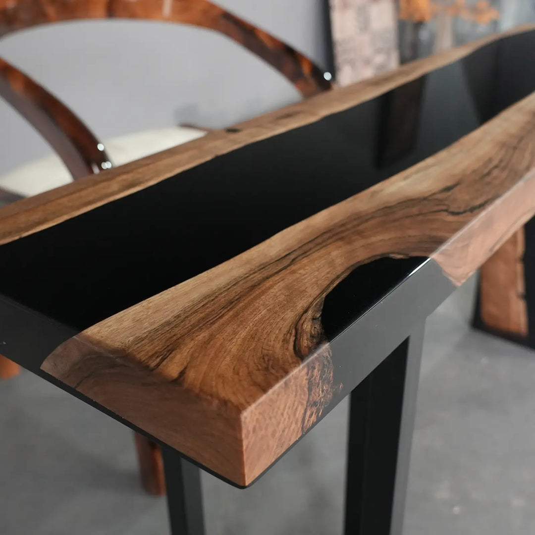 Seawavetable-Textured matte walnut surface paired with high gloss black resin