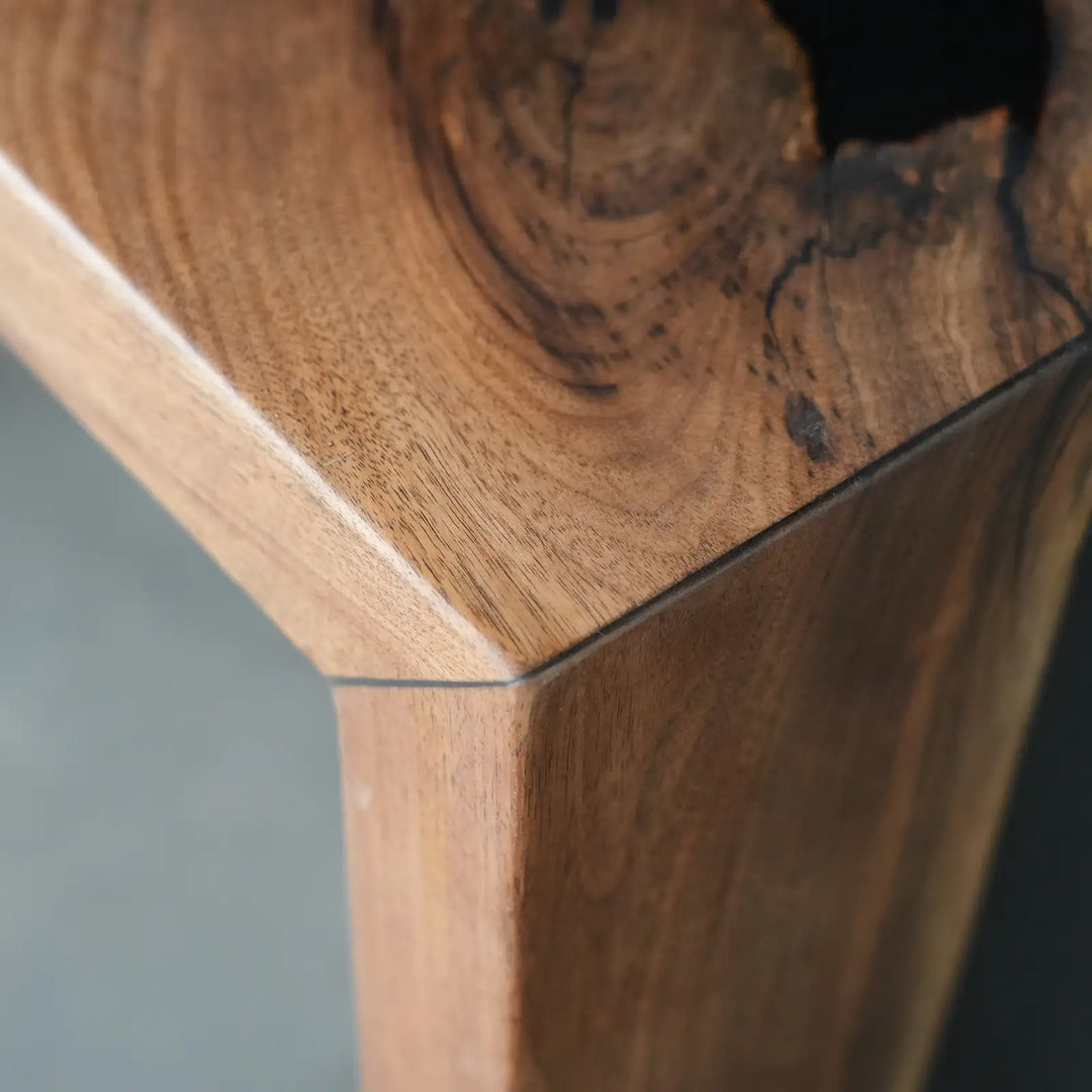 Seawavetable-Textured matte walnut surface paired with high gloss black resin