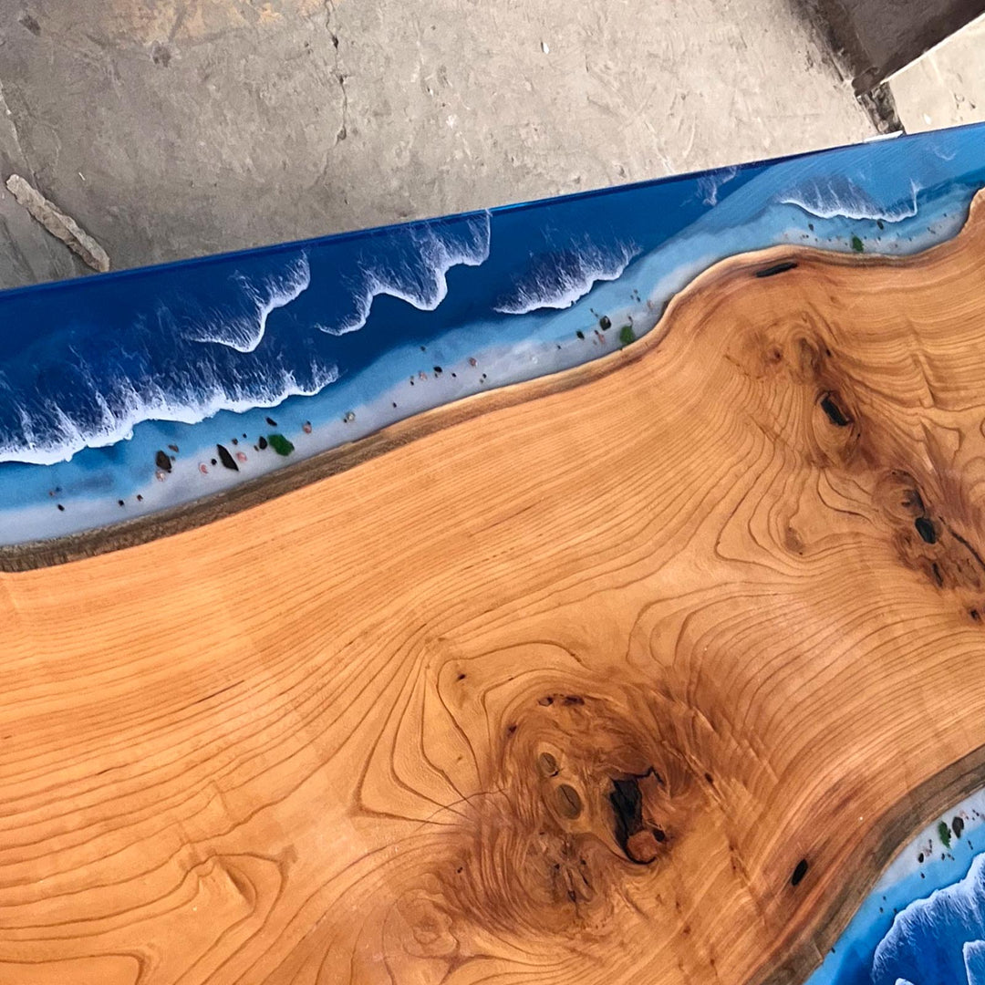 Seawavetable-Close up of ocean wave resin effect on beech wood table California