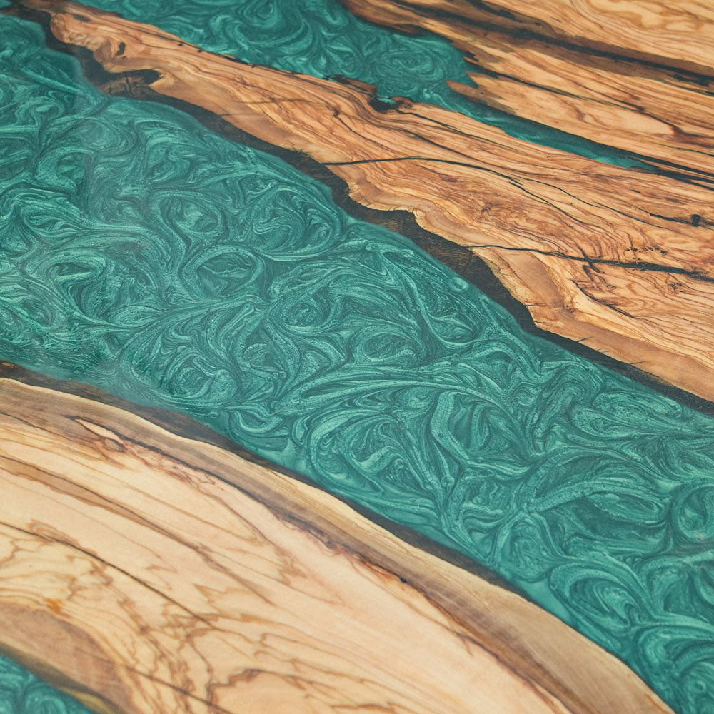 Seawavetable-olive wood river resin table showcasing natural wormholes and depth