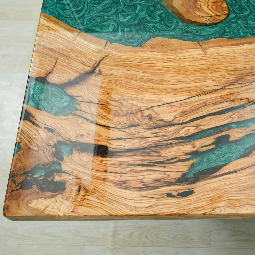 Seawavetable-rustic olive wood epoxy table featuring organic wormholes and resin fill