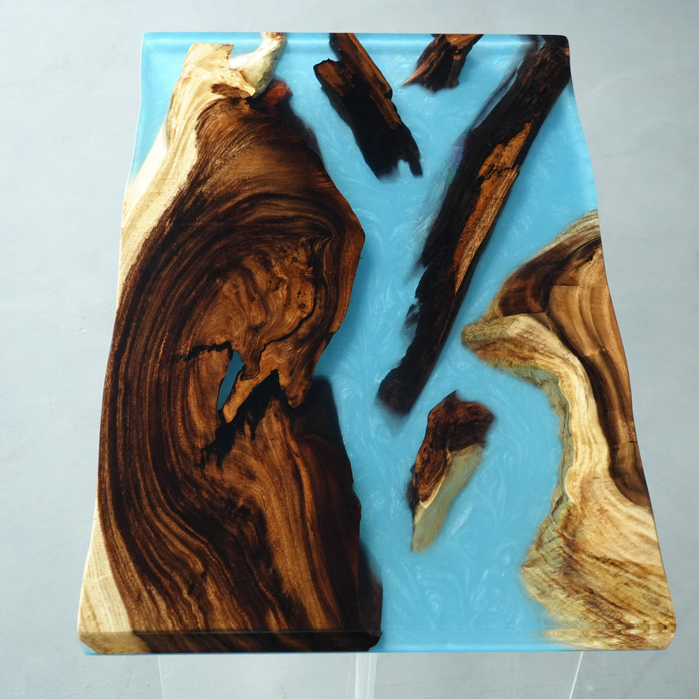 SeawaveTable-Custom epoxy table featuring walnut slabs and ocean-inspired resin design
