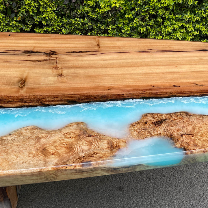 Seawavetable-Handmade epoxy river table featuring Golden Camphor wood and blue resin