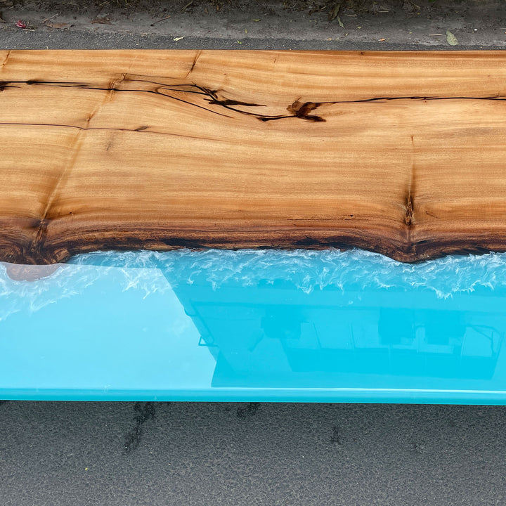 Seawavetable-Large epoxy dining table with striking blue resin and wooden textures