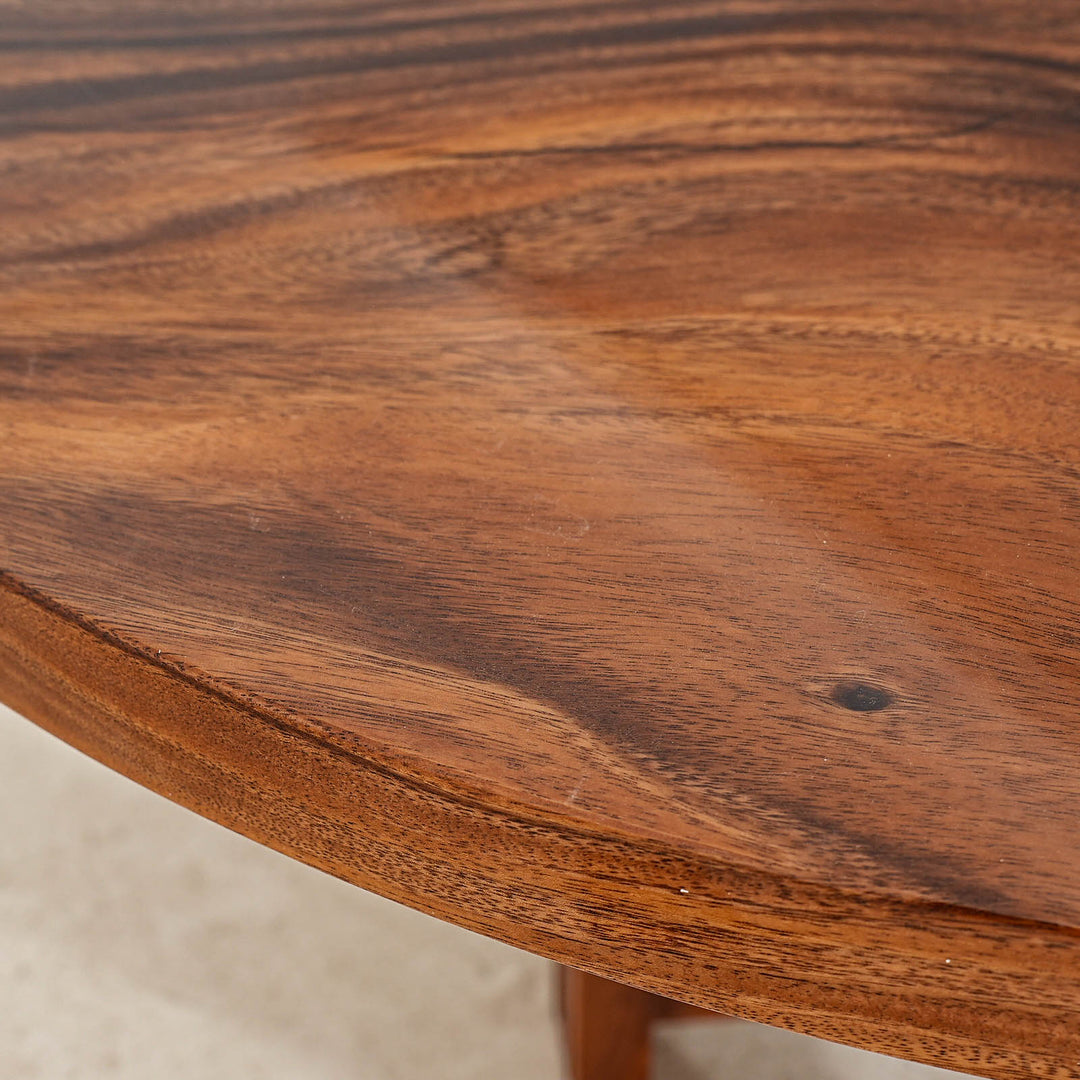 SeawaveTable-Round epoxy river table showcasing live edge walnut wood and vivid resin.