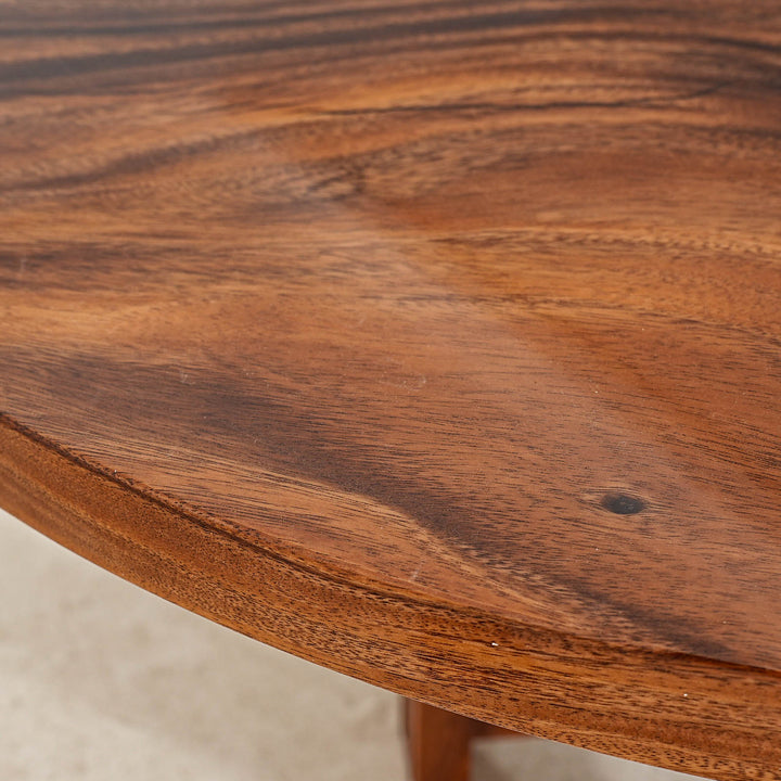 SeawaveTable-Round epoxy river table showcasing live edge walnut wood and vivid resin.