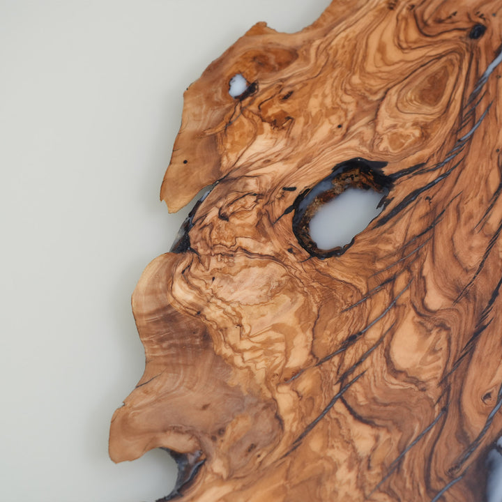Seawavetable-Olive wood and white epoxy table showing detailed natural wood patterns