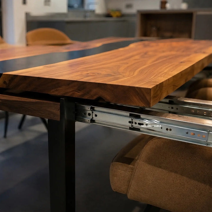 Seawavetable‑Matte surface close‑up walnut and opaque black epoxy on extendable dining table straight edge fold out leaf connection