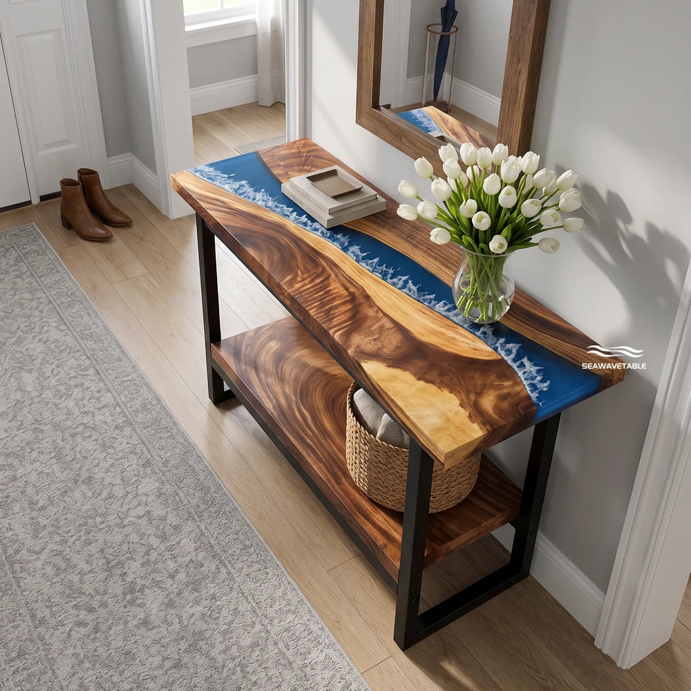 Custom solid wood console table featuring a walnut slab with translucent blue resin inlay and a double-layer design, styled in a modern hallway with soft natural light - SeawaveTable