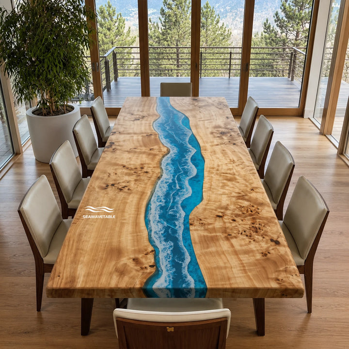 A handcrafted epoxy table with live-edge poplar and vivid blue resin channel, positioned in an elegant dining room setting with soft natural light and contemporary decor - SeawaveTable