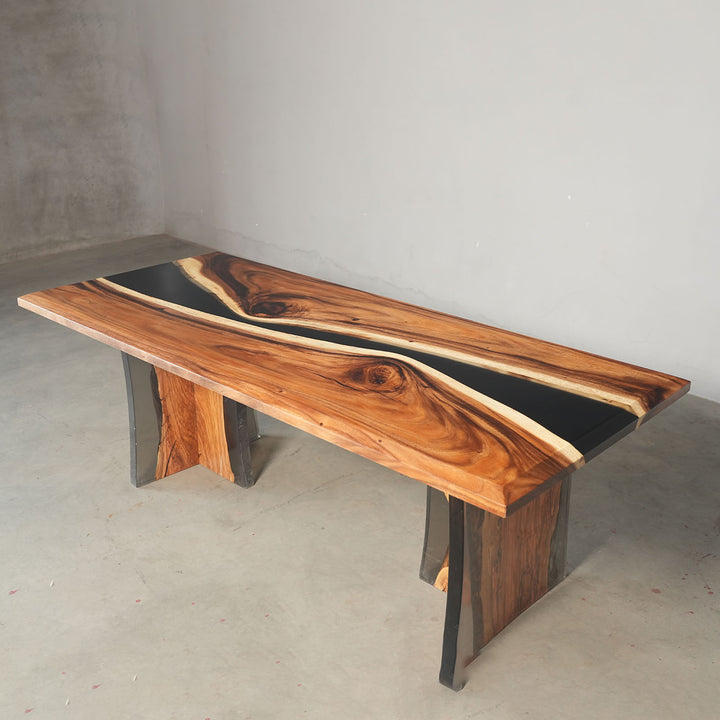 Walnut epoxy dining table exhibited in a professional showroom, highlighting the live-edge design, glossy black resin river, and premium wood grain - SeawaveTable