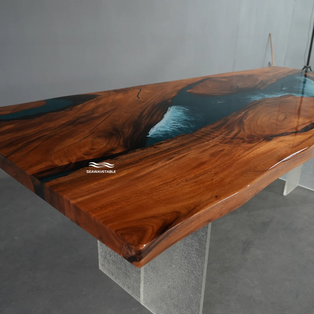 Exhibition view of a custom resin table with walnut wood and flowing blue resin, displayed in a modern furniture gallery or design showroom - SeawaveTable