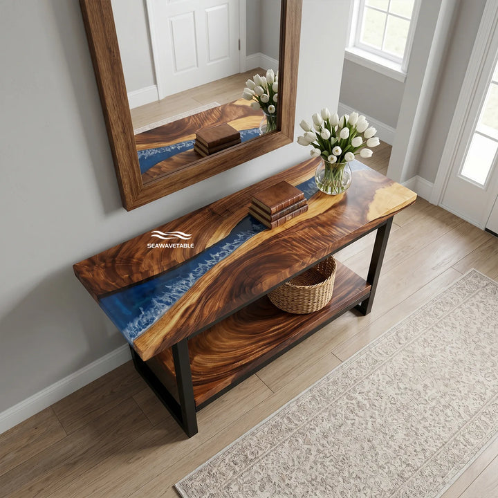 A handcrafted resin table with dual-layer construction, showcasing warm walnut grain and blue resin river, positioned in a contemporary living room corner with plants and decor - SeawaveTable