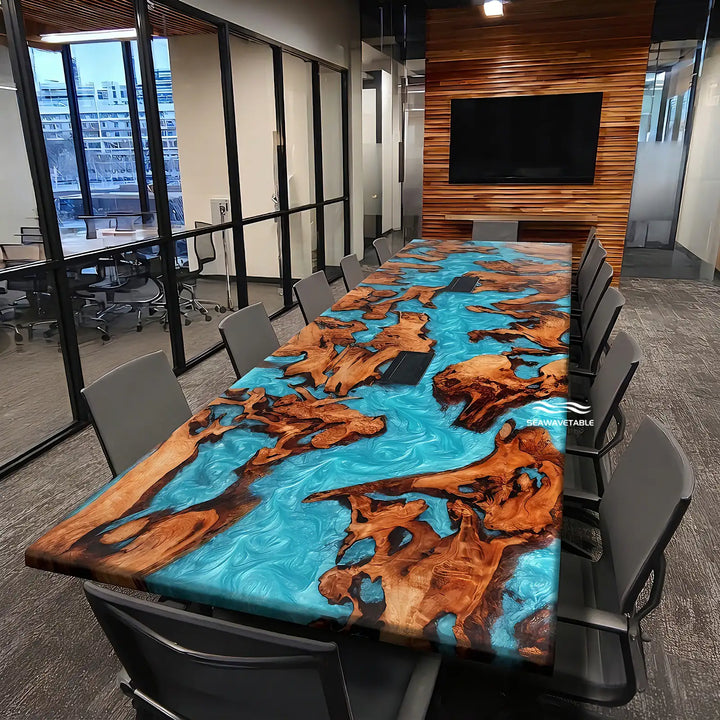 A modern office meeting room featuring a large Cunninghamia blue epoxy table with a stunning natural wood table top, surrounded by black chairs and designed with built-in power outlets for professional conferences - SeaWaveTable