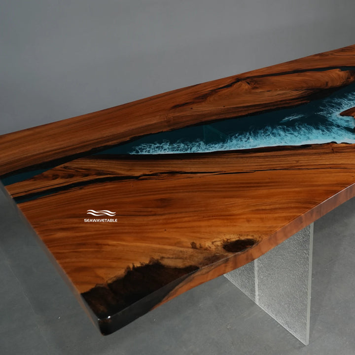 Close-up detail of a resin table showing the glossy blue river channel flowing through the rich walnut grain with smooth reflective finish - SeawaveTable