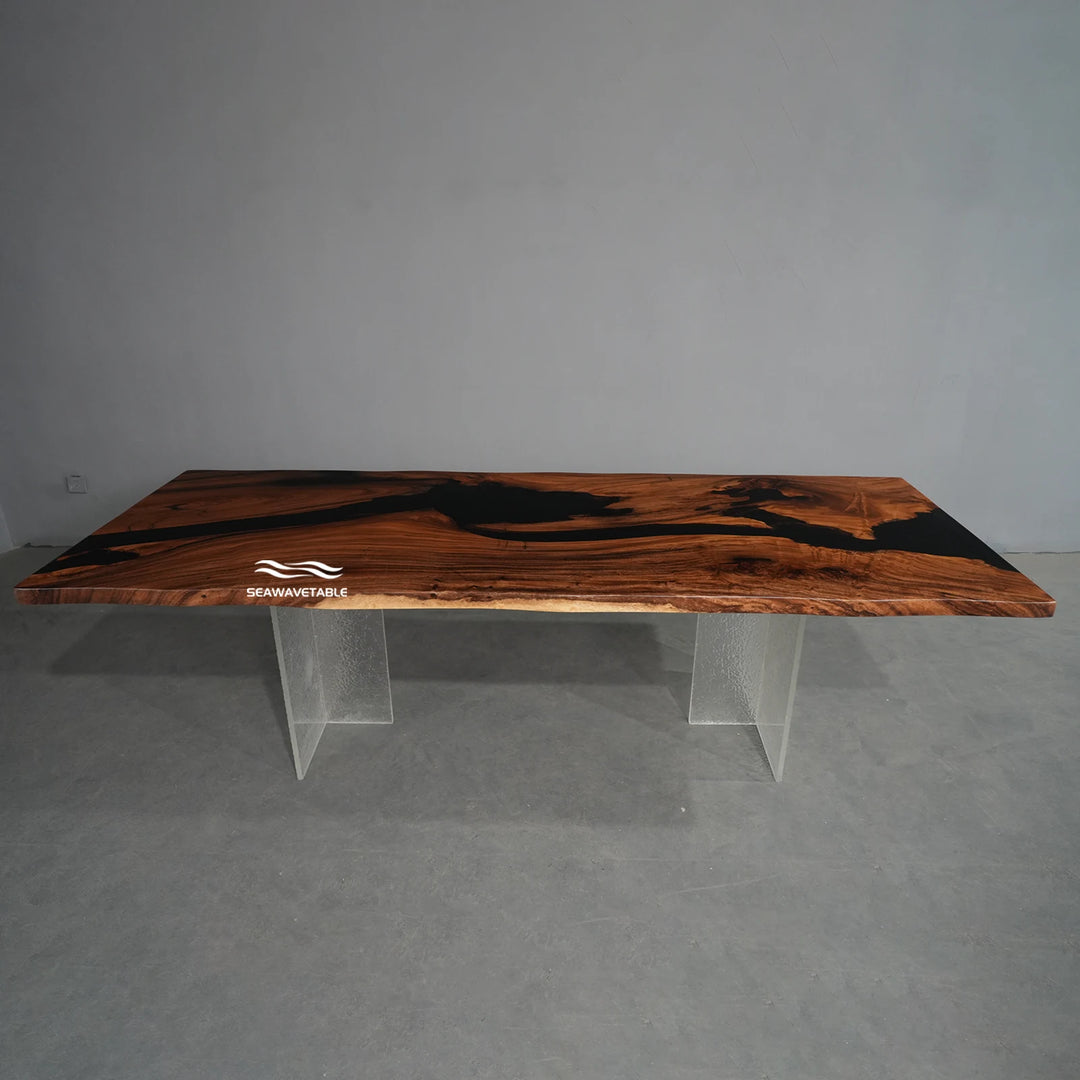 Walnut black epoxy dining table exhibited in a professional showroom, highlighting the live-edge design, dramatic black resin river, and rich walnut wood grain - SeawaveTable