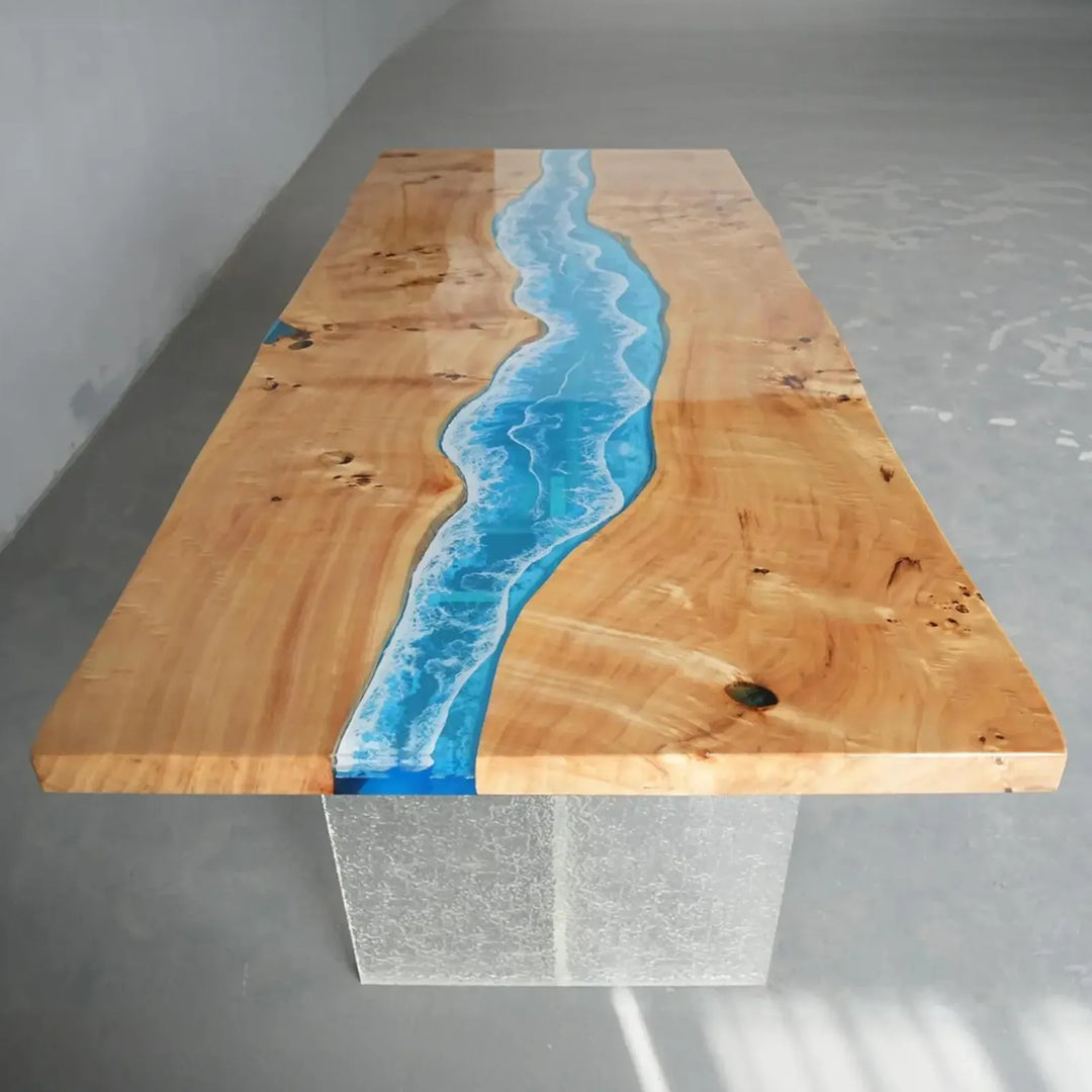 Exhibition view of a custom epoxy table with poplar wood and flowing blue resin, displayed in a modern furniture gallery or design showroom - SeawaveTable