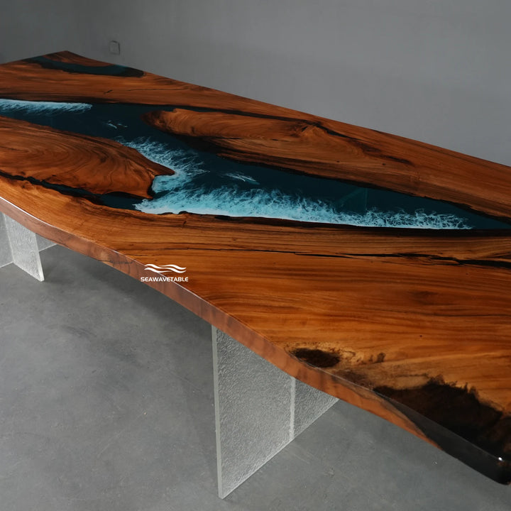A solid wood dining table display featuring walnut slab with blue resin inlay, showcased in a bright studio setting for interior design presentation - SeawaveTable