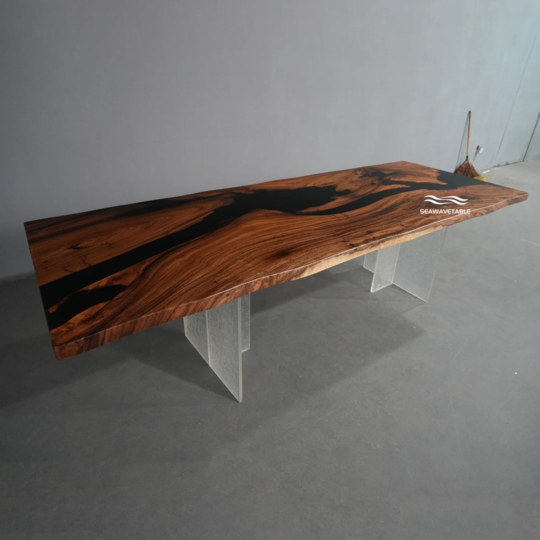 A wood dining table display featuring walnut slab with black epoxy inlay, showcased in a bright studio setting for interior design presentation - SeawaveTable