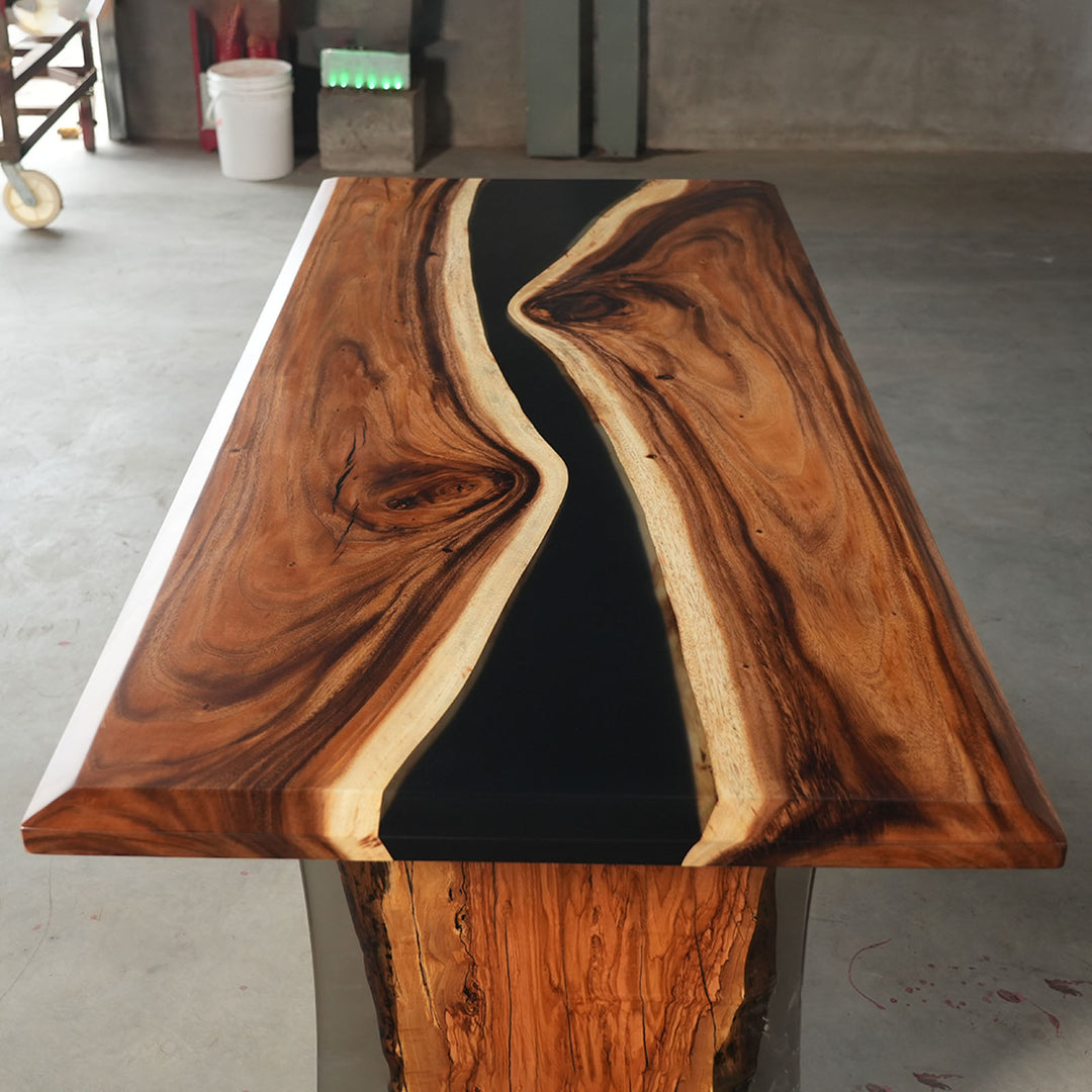 A solid wood dining table display featuring walnut slab with black resin inlay, showcased in a bright studio setting for interior design presentation - SeawaveTable