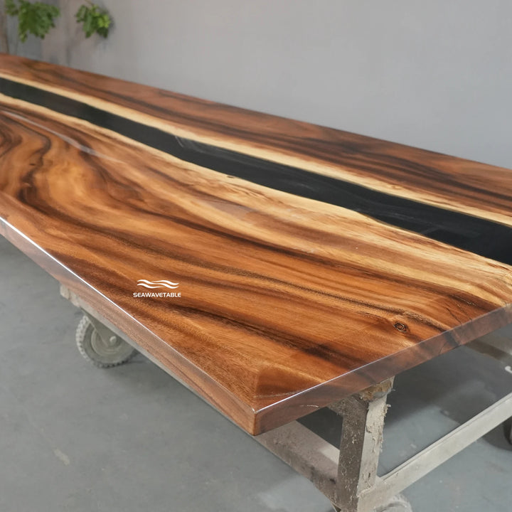 Detail of a wood conference table highlighting the natural walnut grain texture and the beveled edge profile - SeawaveTable