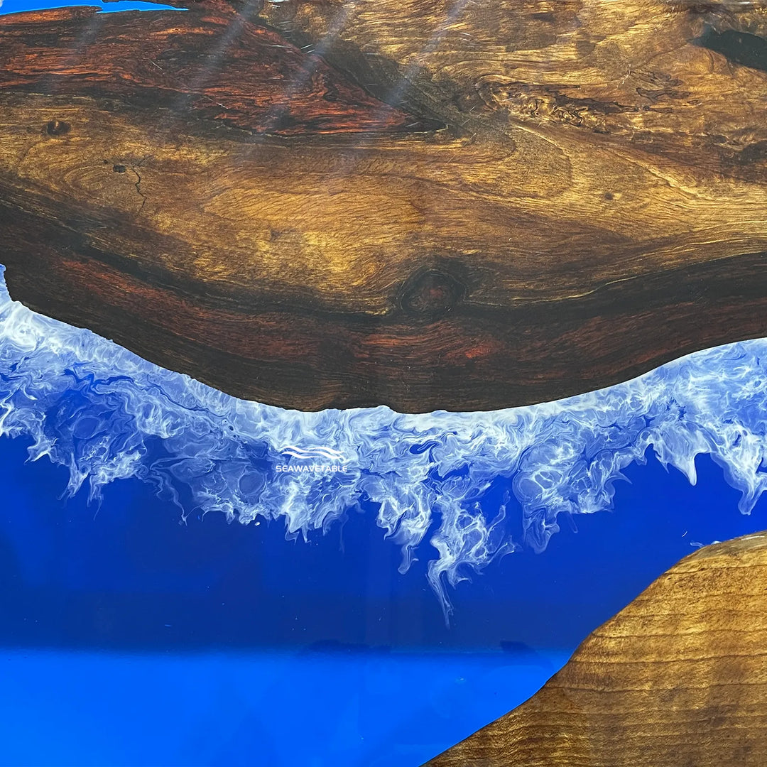 Modern ocean-inspired epoxy table with wave texture and live edge wood