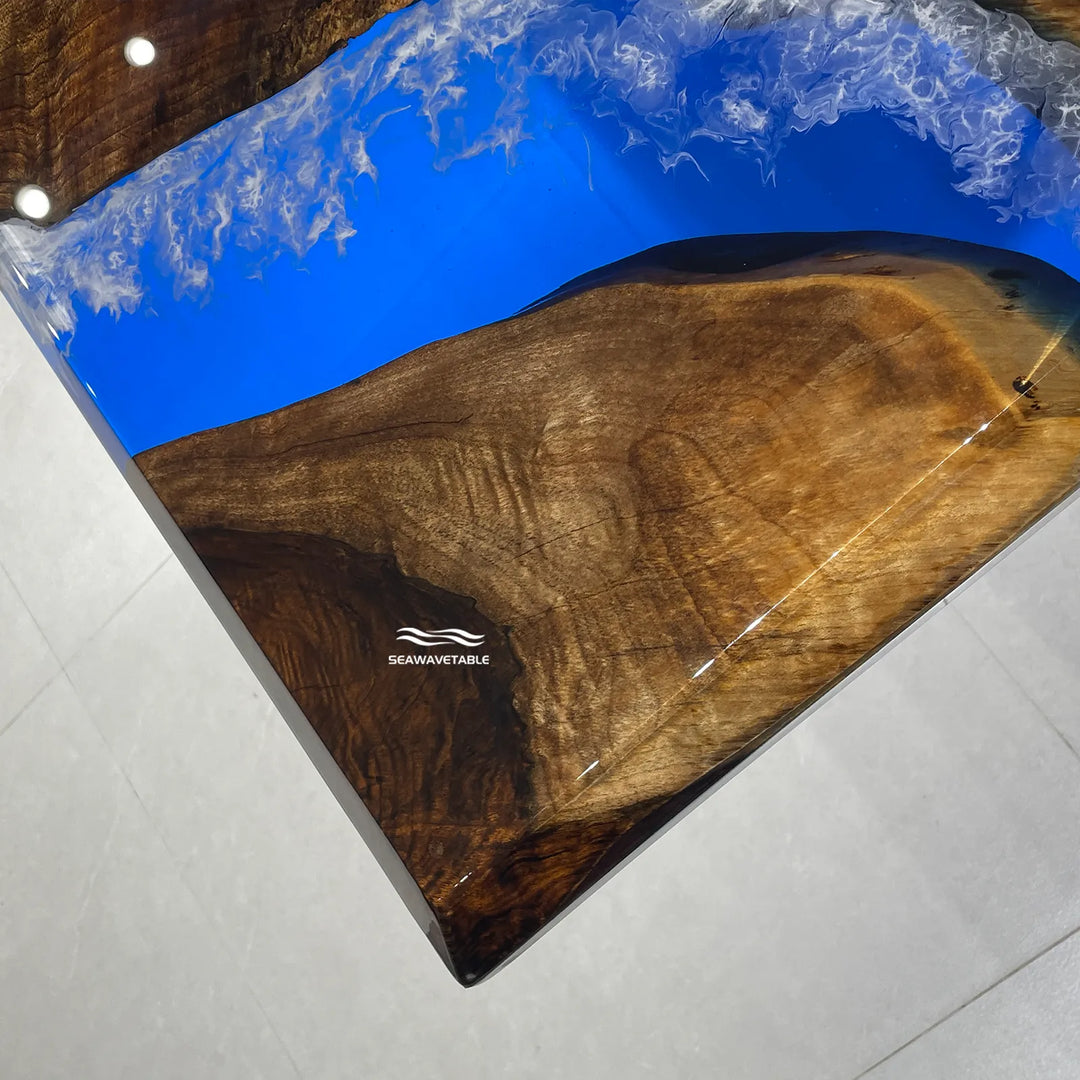 High gloss blue epoxy river table in contemporary open concept home