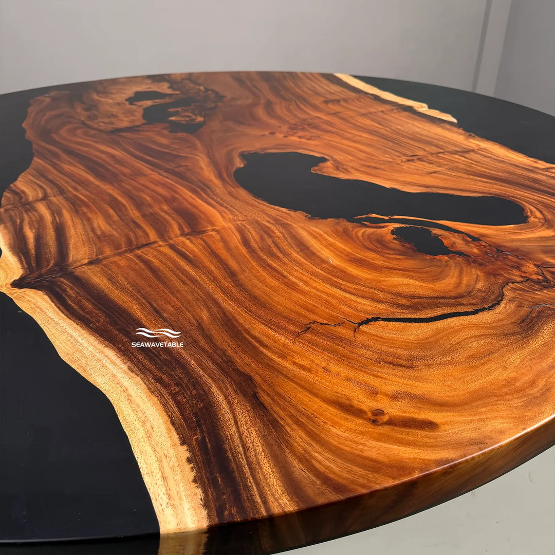 Luxury statement round dining table with black resin contrast