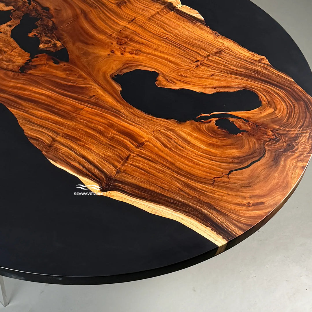 Contemporary round wood slab table with black resin base