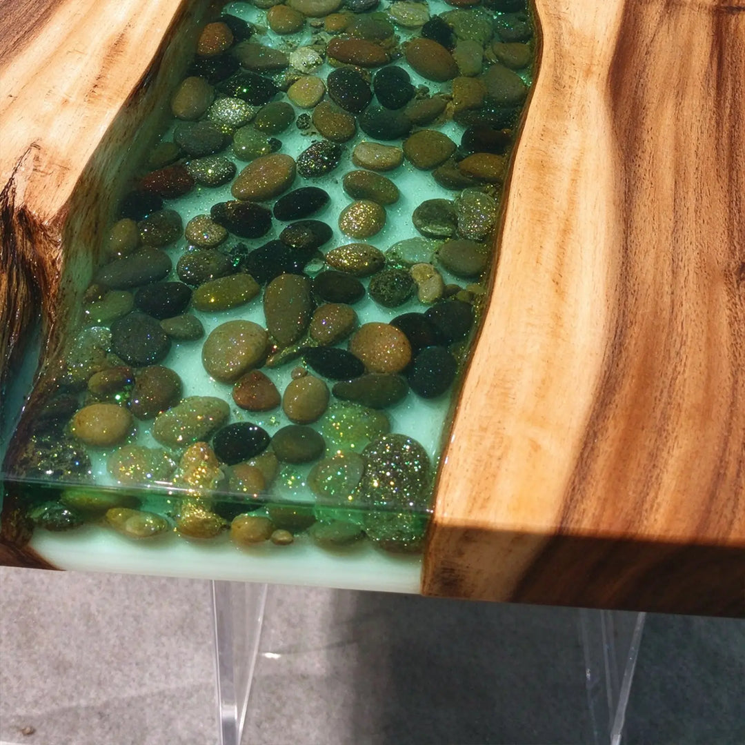 Seawavetable-Statement walnut resin table with winding light green stone river