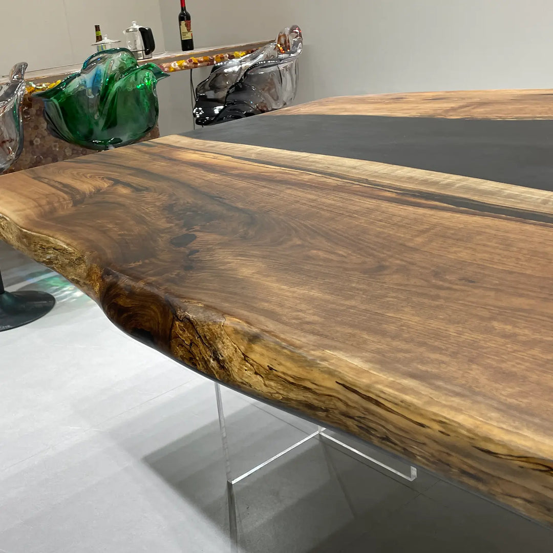 Seawavetable-sleek midnight black resin channel in solid black walnut live edge table