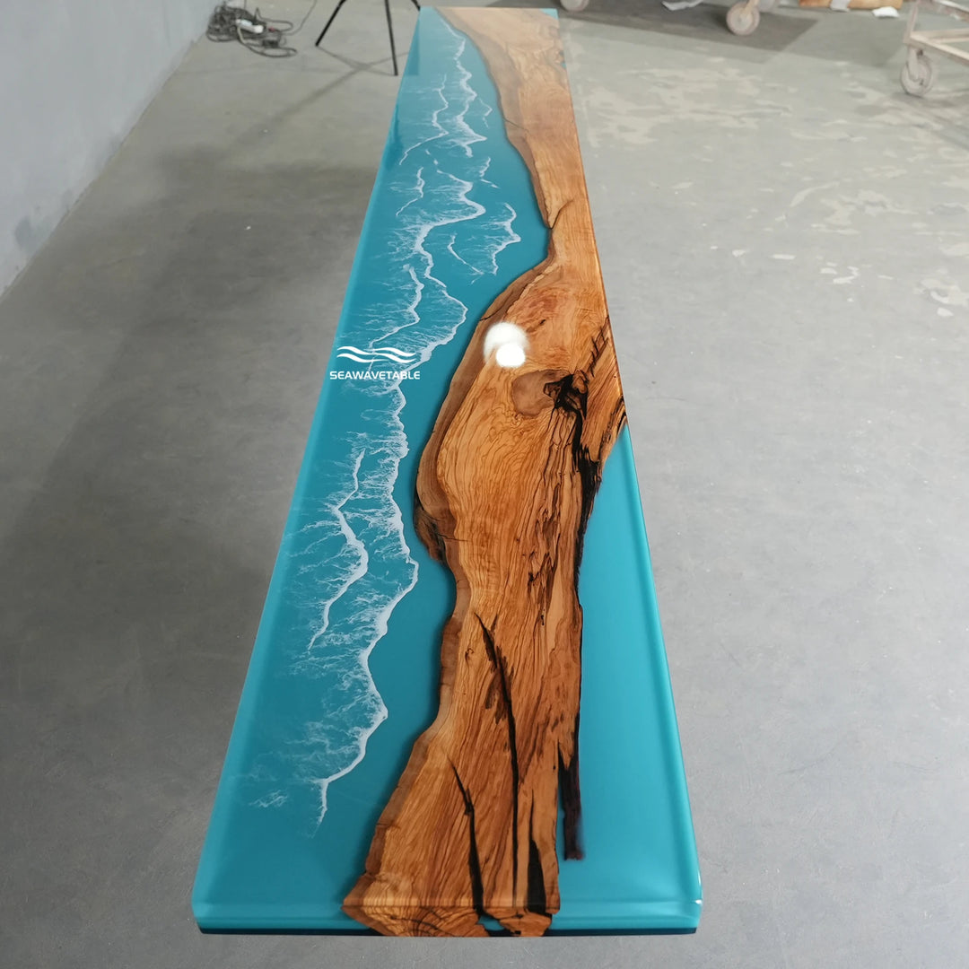 Seawavetable‑Upscale modern epoxy table olive wood hand‑layered turquoise surf resin hallway centerpiece